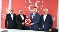 MAGİNDER’den Çiçeği Burnunda MHP İl Başkanı Şengönül’e Ziyaret