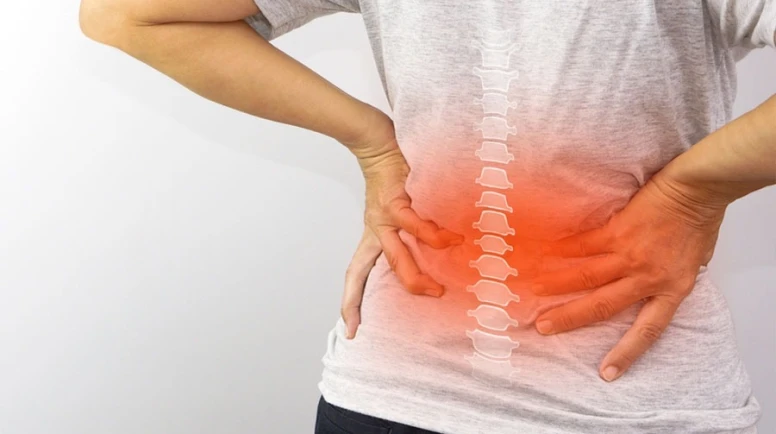 Bel Ağrısını Hafife Almayın: Bel Kayması (Spondilolistezis) Felç Riskine Yol Açabilir Mi?
